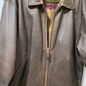 Real heavy leather very nice color and very good condition size l